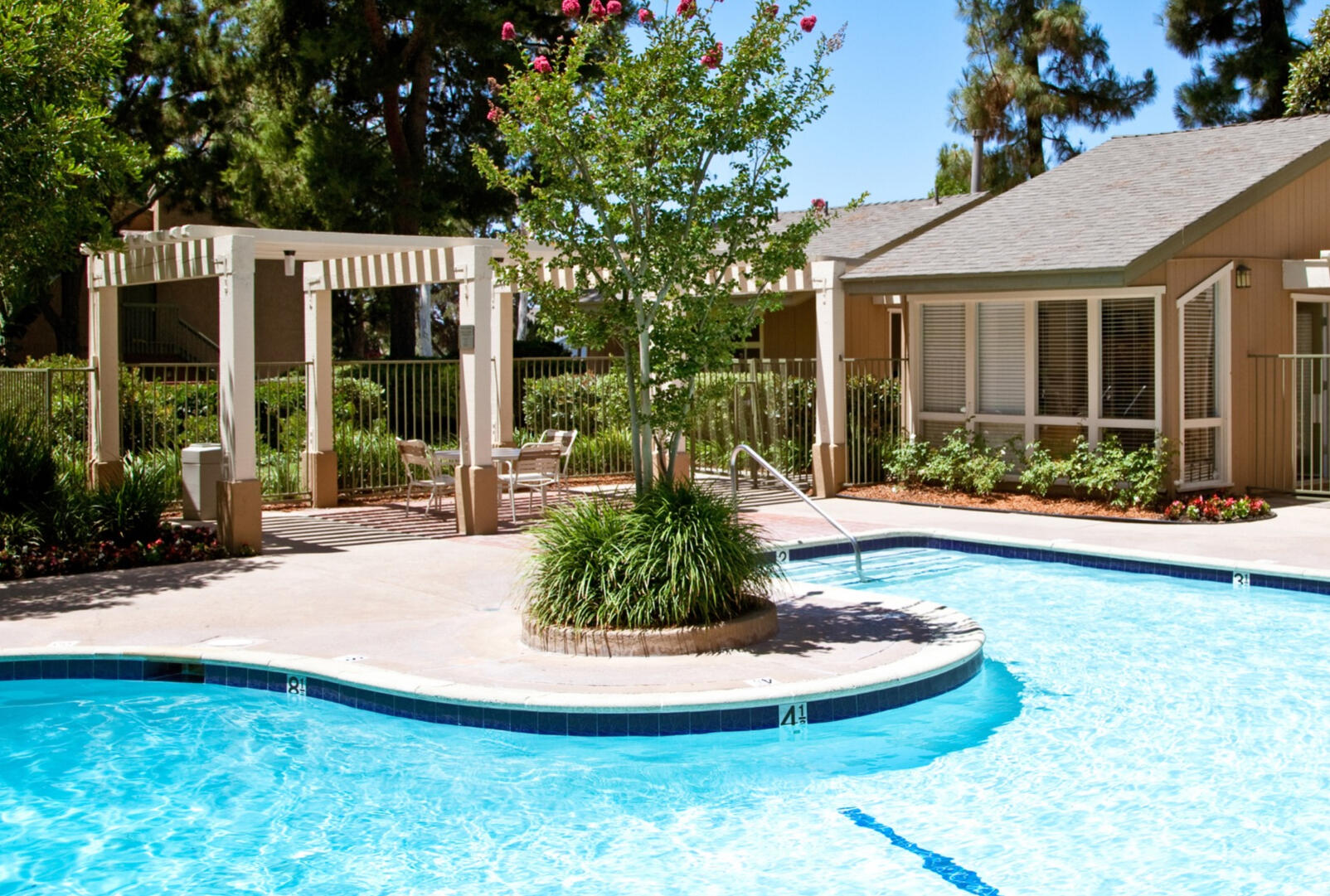 Picture of Apartment Pool with Leasing Office in background